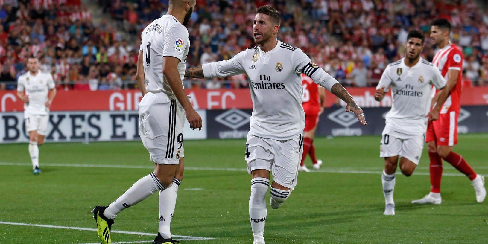 Karim Benzema och Sergio Ramos fick båda näta från straffpunkten för sitt Real Madrid borta mot Girona.